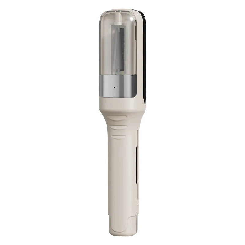 Off-white hair trimming device with transparent upper chamber and visible blade