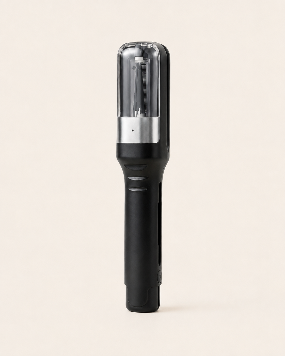 Black hair trimming device with transparent upper chamber and visible blade
